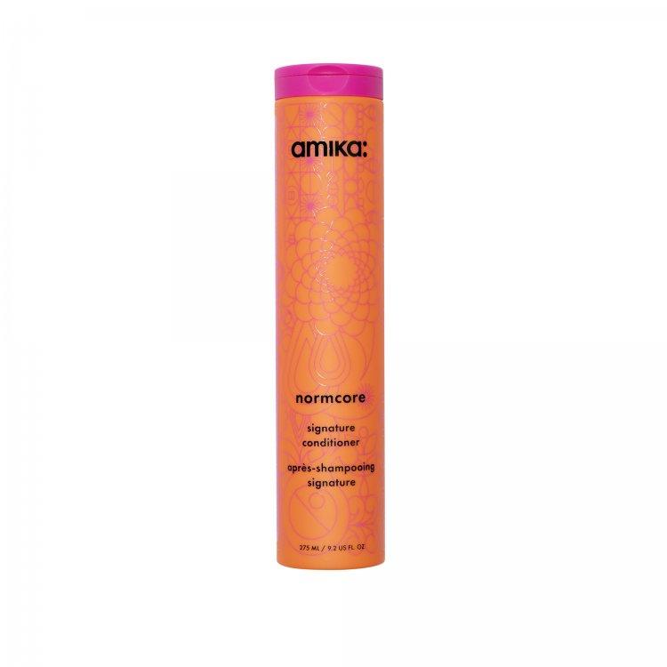 Amika normcore signature conditioner deeply moisturizes and softens hair